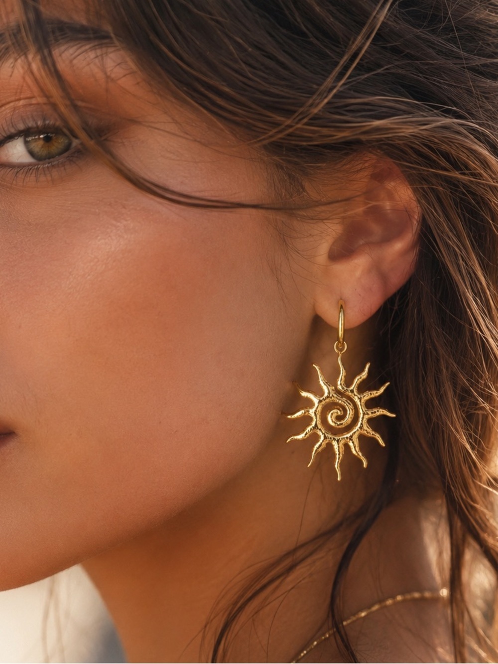 Gold Sunburst Dangle Earrings